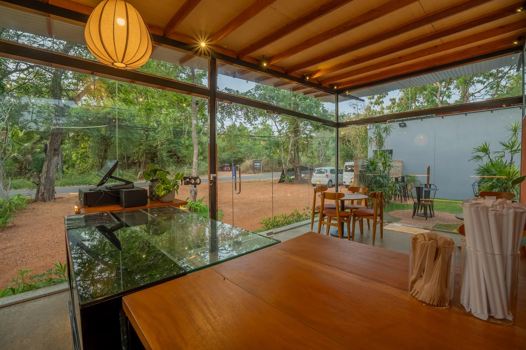 A table overlooking the green CoffeeLab surroundings